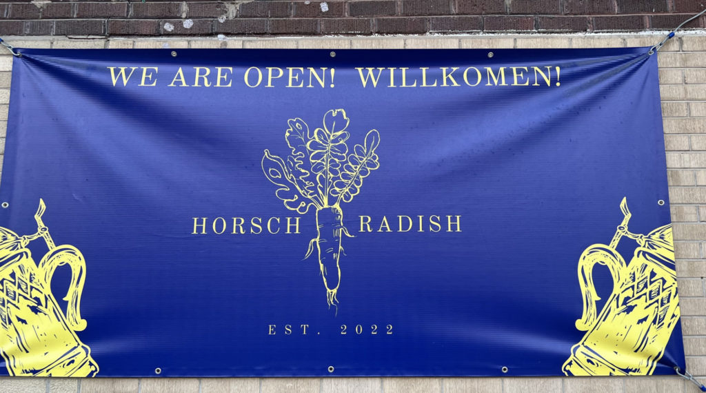 The sign outside of Horsch Radish.